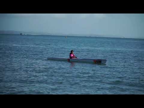 Alexandra (12) letting her surf ski move freely