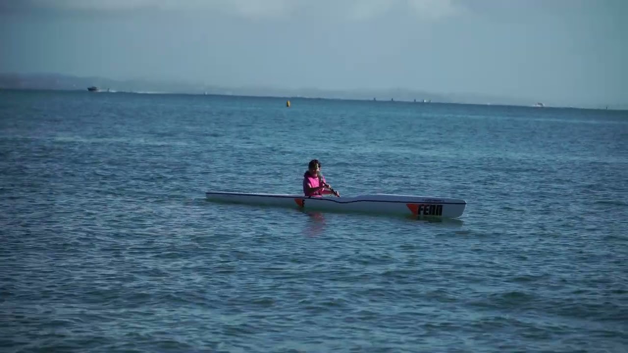 Alexandra (12) letting her surf ski move freely