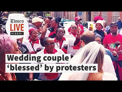 Wedding couple ‘blessed’ with song by Nehawu members amid protest at home affairs