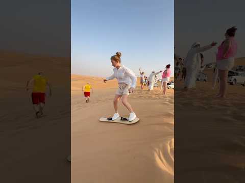 SAND BOARDING IN DUBAI RED SAND DESERT 🐪  #sandboarding #youtubeshorts #trending #trendingshorts