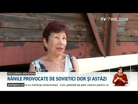 Două vagoane de tren, similare celor folosite la deportările staliniste, în PMAN din Chișinău