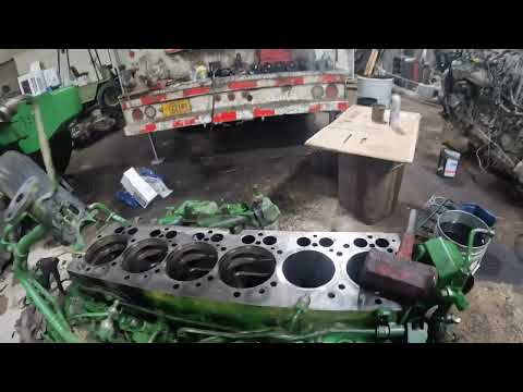 John Deere 6068 engine reassembly.