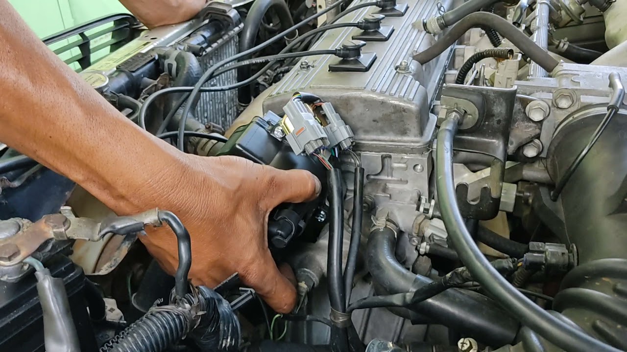 Probando Distribuidor de encendido de Toyota Corolla fuel injection (ajustando tiempo).