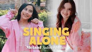 Kadr z teledysku Singing Alone tekst piosenki Melani García feat. Aubrey Miller