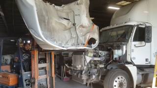 Taking the hood of a Freightliner