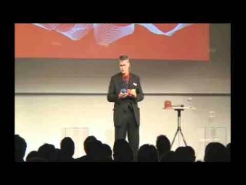 DE Suchen 0:02 / 4:16 Business-Jonglage mit 3+4 Bällen zum Thema "IT", "Mittelstand" und "Innovation"