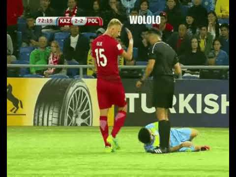 Kamil Glik of Poland heals injured player