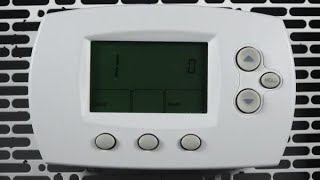 How to enter and navigate advanced programming on the Pro 6000 thermostat - Resideo