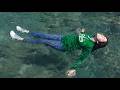 Wetlook Leyla In The Sea With Nike Air Force 1 Jeans And Green Sweater