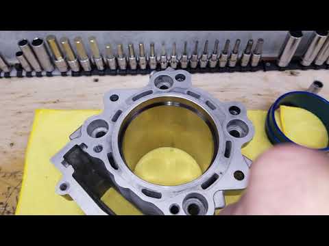 File fitting rings to properly gap. Hope this helps