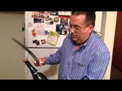 Opening a Champagne bottle with a saber for 2014 New Year