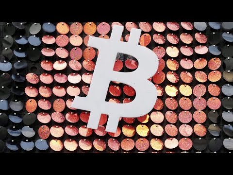 Bitcoin hits new record, nears $1 trillion market cap