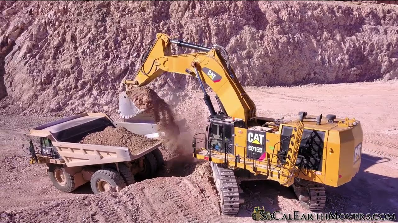 Mountain removal 101 – You bring in a Caterpillar 6015B and 777’s