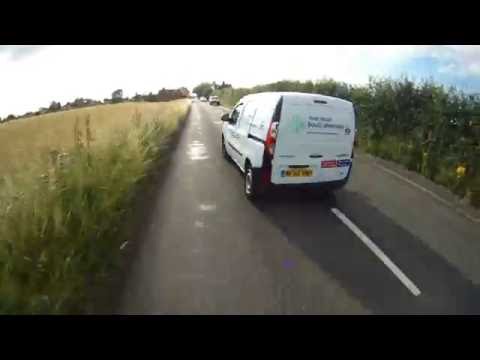 MF65HWX - Boots Van Close Pass Into Traffic
