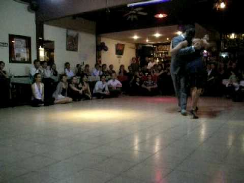  Fabian Peralta  and  Virginia Pandolfi  are  dancing  to  the  tango  "  Poema  "