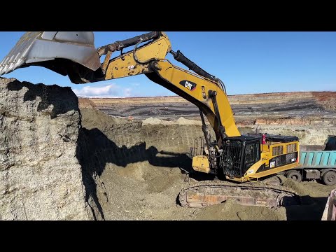 Caterpillar 385C Excavator Loading Mercedes & MAN Trucks - Interkat SA