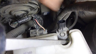 FORD EXPLORER WINDOW WASHER RESERVOIR PUMP REPLACEMENT