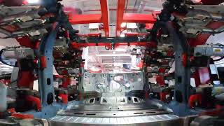 Model Y going through body shop｜Tesla