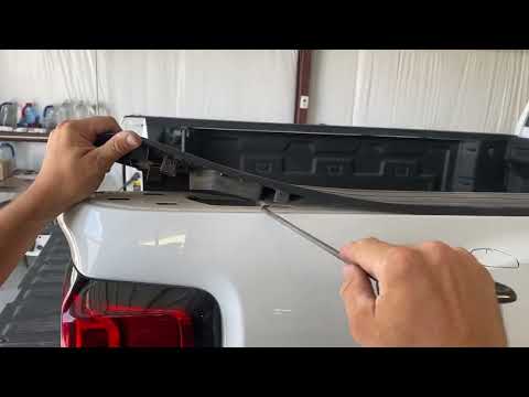 How to remove bed cap without breaking tabs Chevy GMC