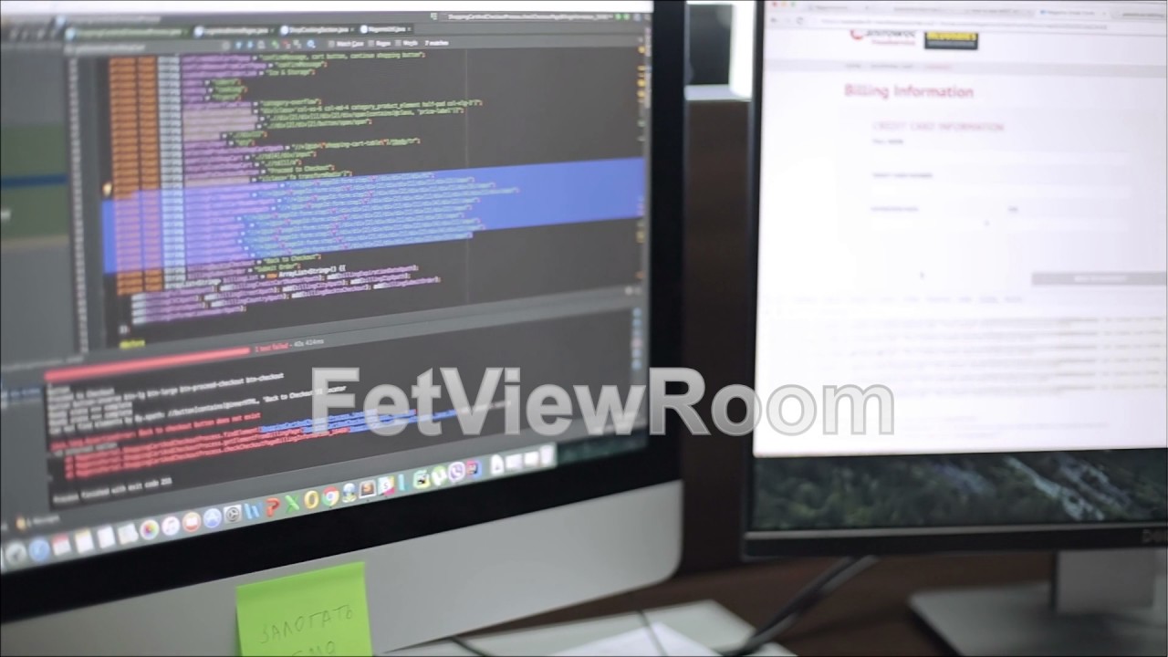 Programmer working with multiple monitors