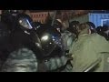 'Brutal' police clear protestors in Ukraine by beating them with batons