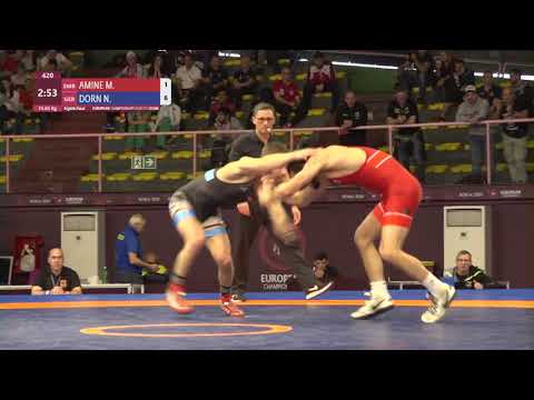 1/8 FS - 65 kg: M. AMINE (SMR) v. N. DORN (GER)