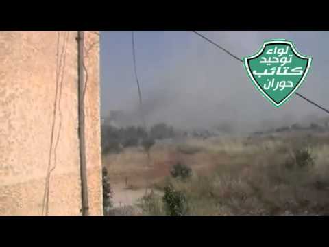 انتشار عناصر كتيبة فرسان القادسية التابعة للواء توحيد كتائب حوران على الجبهة الأمامية لمدينة خربة غزالة رغم القصف المدفعي ضمن معركة جسر حوران