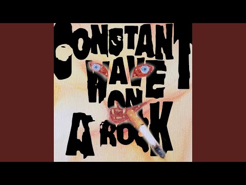 Constant Wave On A Rock