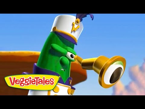 Green veggie chef character blowing a brass horn with a VeggieTales logo in the bottom-left corner, set against a blue sky.
