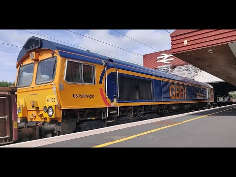 Roaring GBRf Class 66 EMD "Peterborough United" accelerates through Birmingham International