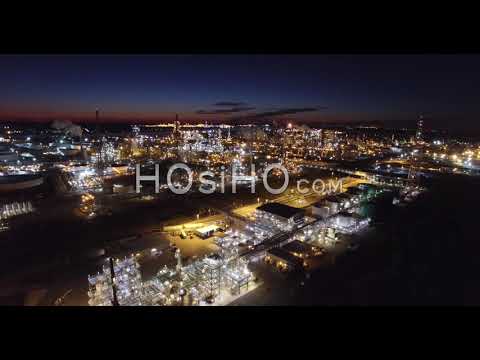 Aerial View Over Huge Industrial Oil Refinery At Night, United States Of America