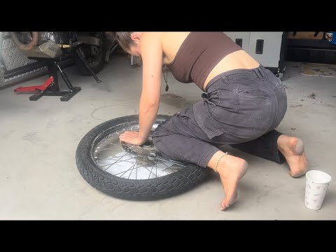 Barefoot Goddess, changing my motorcycle front tyre