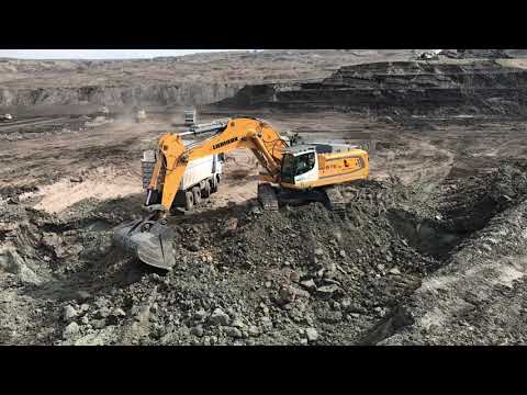 Liebherr 976 Excavator Loading Trucks