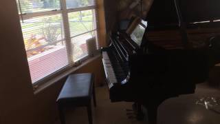 My Young Chang 7ft Grand piano playing let it snow for the Christmas spirit