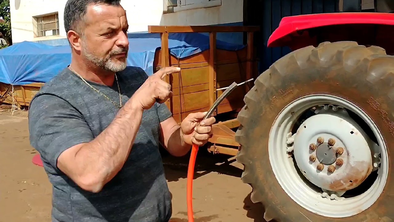 Como colocar água num pneu agrícola