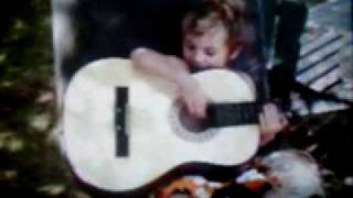 Michael Whitmore playing the guitar