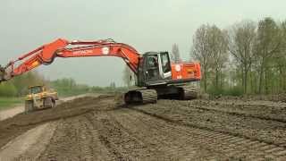 Jan De Nul Group - Construction of a compartment dike in Vlassenbroek (Belgium)