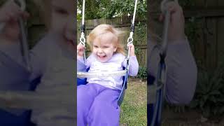 Lucy on a swing