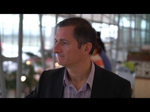 Why do the new runway high intensity approach lights extend into Moreton Bay?