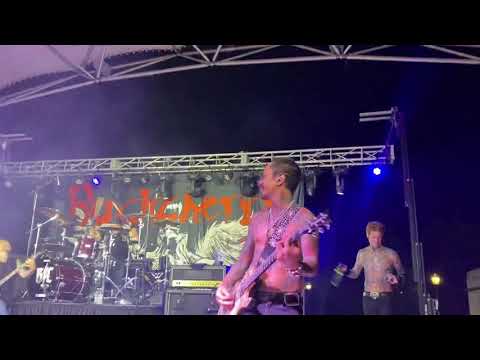 Stevie D of Buckcherry giving a fan a stage used Diamond Guitar from the stage at Rock on the River!