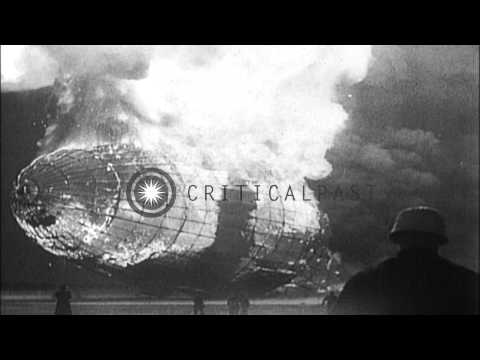 LZ-129 Hindenburg airship engulfed in flames crashes into ground at Lakehurst Nav...HD Stock Footage