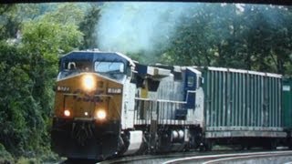 preview picture of video 'CSX 577 & 7336 Pull Trash Train East Thru St Denis'