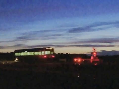 V/line Sprinter railcar at sunrise - Passenger train at country level crossing - PoathTV
