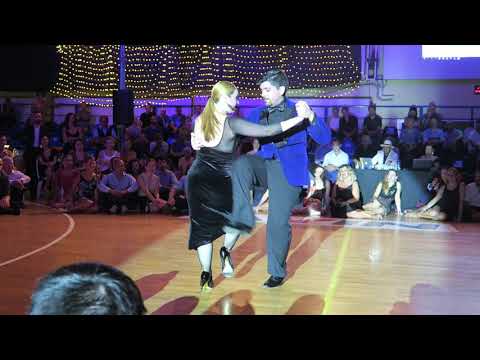  Fernando Sanchez  and  Ariadna Naveira  are  dancing  to  the  tango  "  Arrabal  "  by  Pedro Laurenz  at  A los amigos tango festival  in  2019