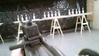preview picture of video 'Bowling Pin Shoot - Uzi semi-auto 1/8/11'