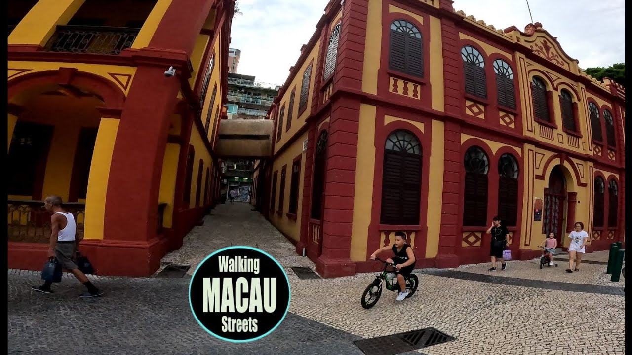 Join tourists on their exploration of Tap Seac Square, known for its historic buildings and vibrancy.