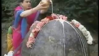 Hindu puja (Worship) on a traffic stone barricade 