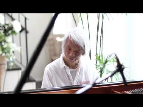 研究者は音楽アルバムを DNA 形式で保存します