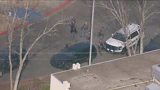 McEachern High School secure after two non-students shot in parking lot, police say