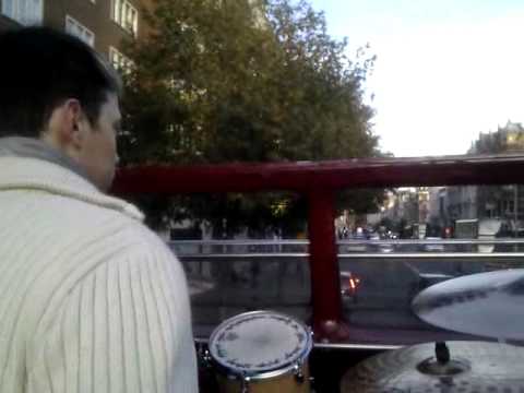 Luka / Starman - drumming on top of a doubledecker and driving through London